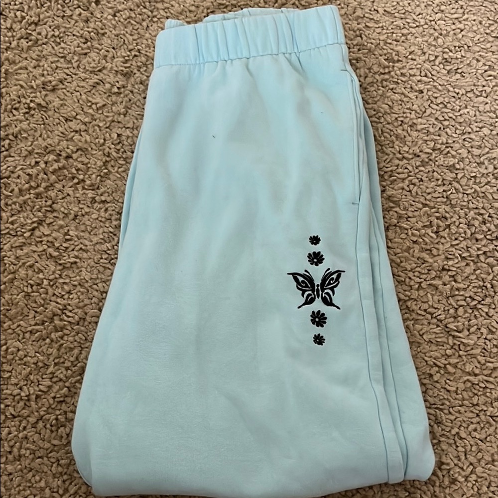 Hollister Light Blue Sweatpants with Black Butterfly Design